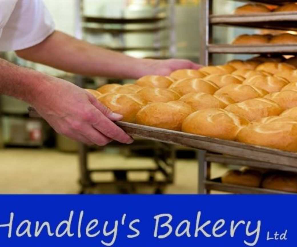 Handleys Bakery, man holding tray with baked buns